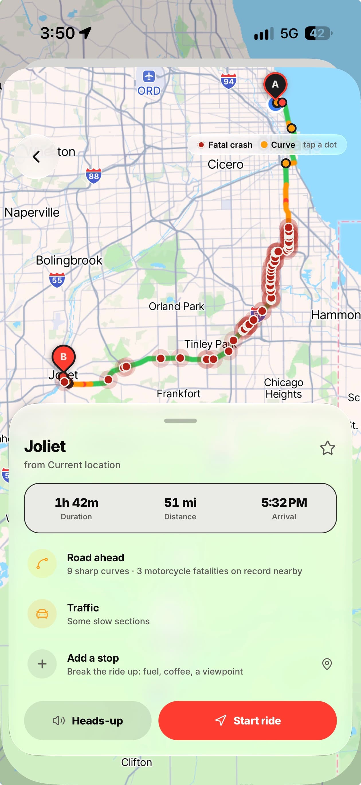 A route to Joliet with fatal-crash and sharp-curve markers along it, above a preview card giving duration, distance, arrival, the road ahead and traffic, with Heads-up and Start ride buttons.
